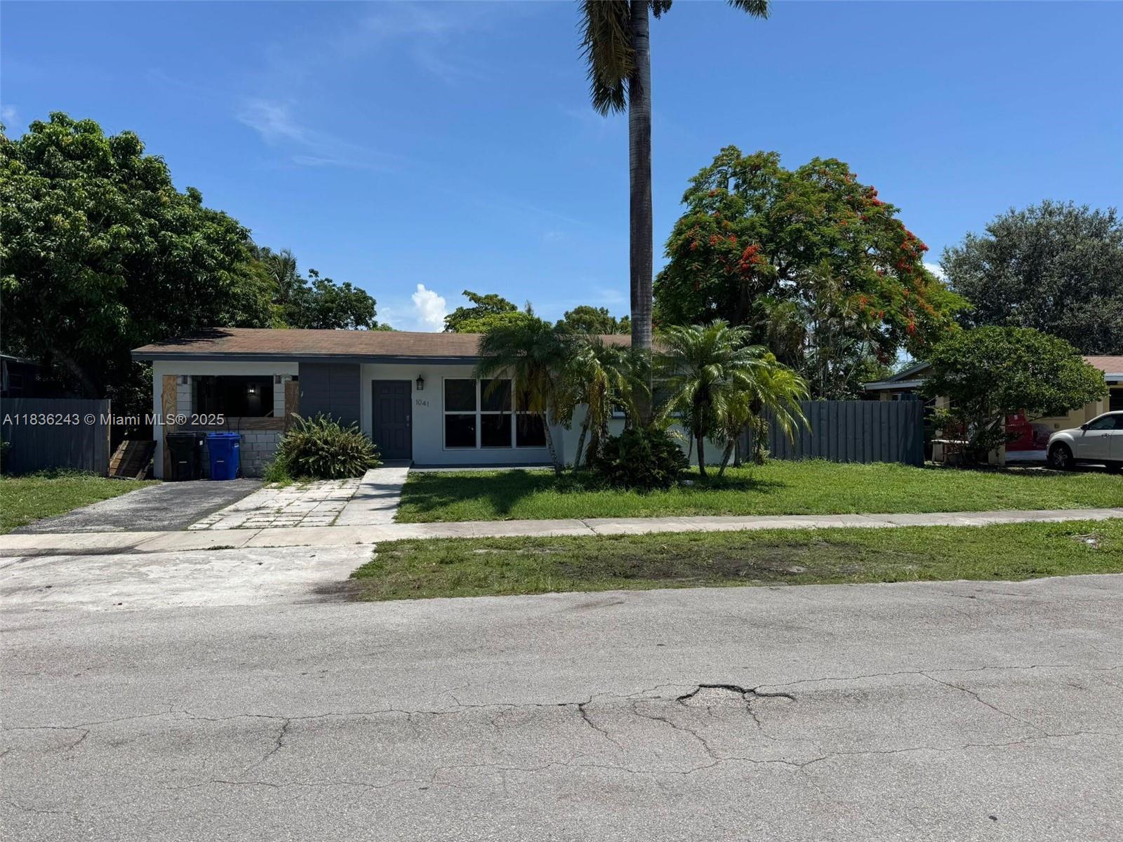 This charming Miami home located at 1041 NE 178th Ter offers a spacious layout with four bedrooms and two bathrooms. Featuring a bright and airy living space, the property includes a modern kitchen with updated floors, bathrooms, kitchen as well as hurricane impact windows and doors. The large backyard provides a great outdoor area for relaxation or entertaining. Conveniently located near the beautiful canal, A must see that wont last long.