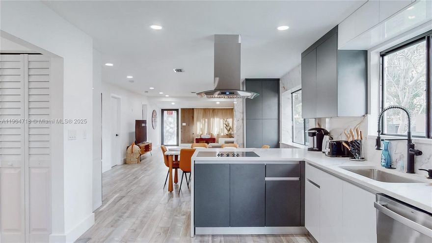 Welcome to this beautifully updated, move-in ready 4 bd / 2 ba home located in prime East Hollywood. This home features an open, functional, and spacious layout with plenty of natural sunlight. The kitchen is fully renovated with brand new stainless steel appliances. This property offers a brand new roof, and new impact windows and doors throughout the entire home. The oversized garage is equipped with a new garage door, plumbing and electricity, and also has impact windows-easily convertible to a one-bedroom efficiency or guest suite for added income potential. This 11,500 sqft lot also has a pool, deck, and a large space for outdoor entertainment. Perfect for homeowners or investors alike, it is close to the beach, shopping centers and major highways. DONT MISS THIS TURN-KEY OPPORTUNITY!