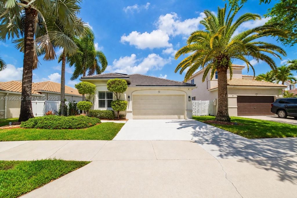 Photo of 717 Tanglewood Cir, Weston, FL 33327 (MLS # A11996242)