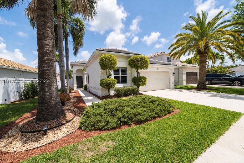 Photo of 717 Tanglewood Cir, Weston, FL 33327 (MLS # A11996242)