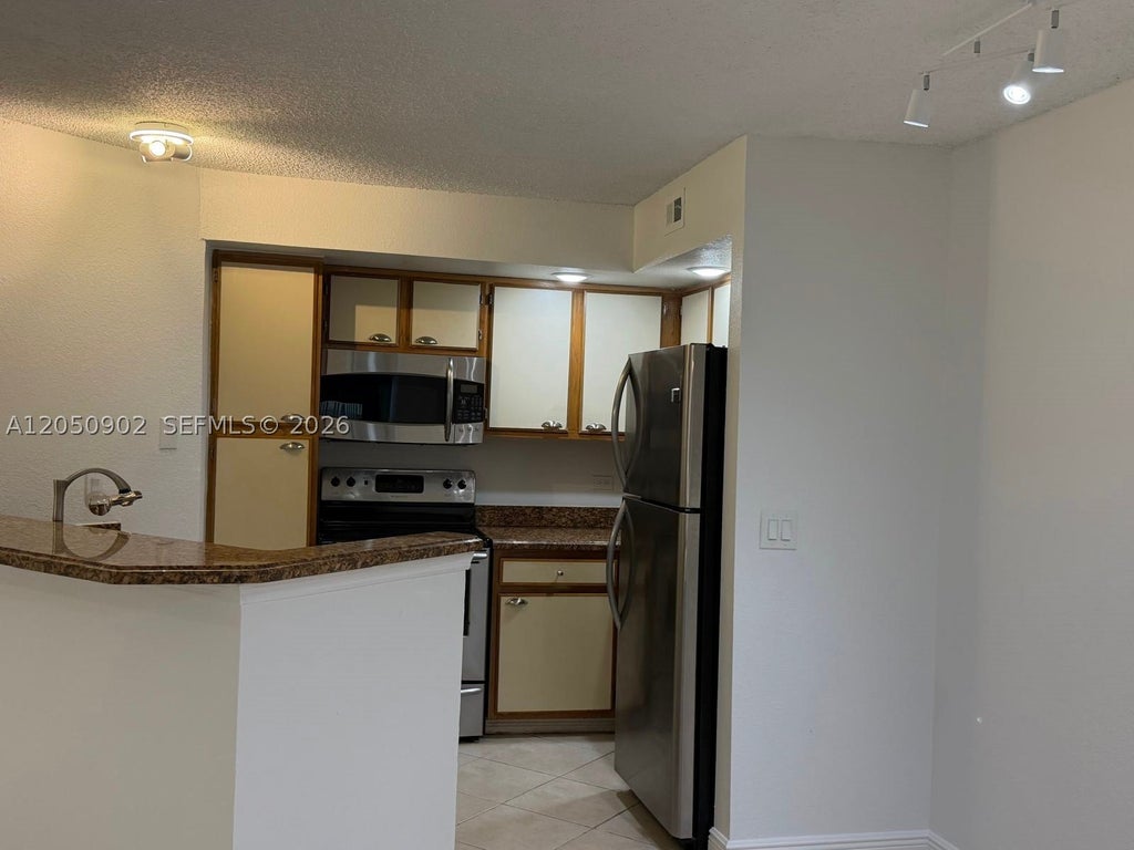 Photo of 643 Vista Isles Dr #1812, Sunrise, FL 33325 (MLS # A12050902)