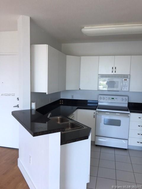 Spectacular skyline of the Roads and Brickell... CORNER unit 1 bedroom 1 bath, living room with top to bottom glass window and a large balcony, master room with walking closet, washer and dryer inside unit. all white kitchen very well kept...freshly painted. Location location !!!!off the heavy traffic of Brickell, minutes from
Coal Gables, Coconut Grove, Merrick Park, the Roads, US1 and UM...2 Parking cover spaces. won't last
condominium offers a roof top deck, exercise room, pool and Jacuzzi.