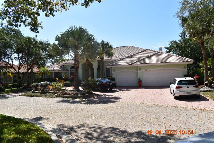 Located in the award winning community of The Isles, a 5//4.5 home that truly has it all. From the private ample lot, lush views to pool to fireplace and impact glass, with abundant living spaces. An oasis away from all.