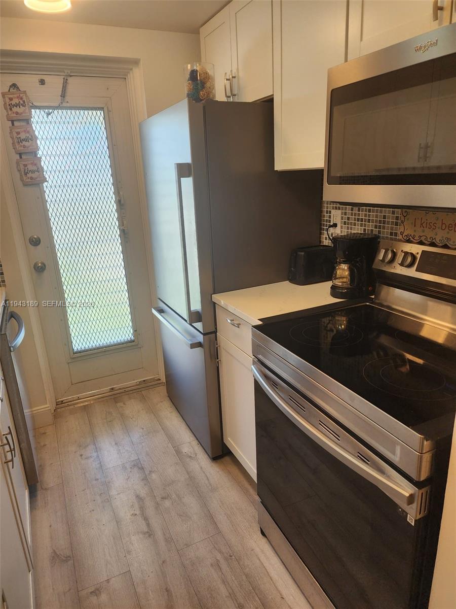 LEISUREVILLE LAKE CONDO - Residential