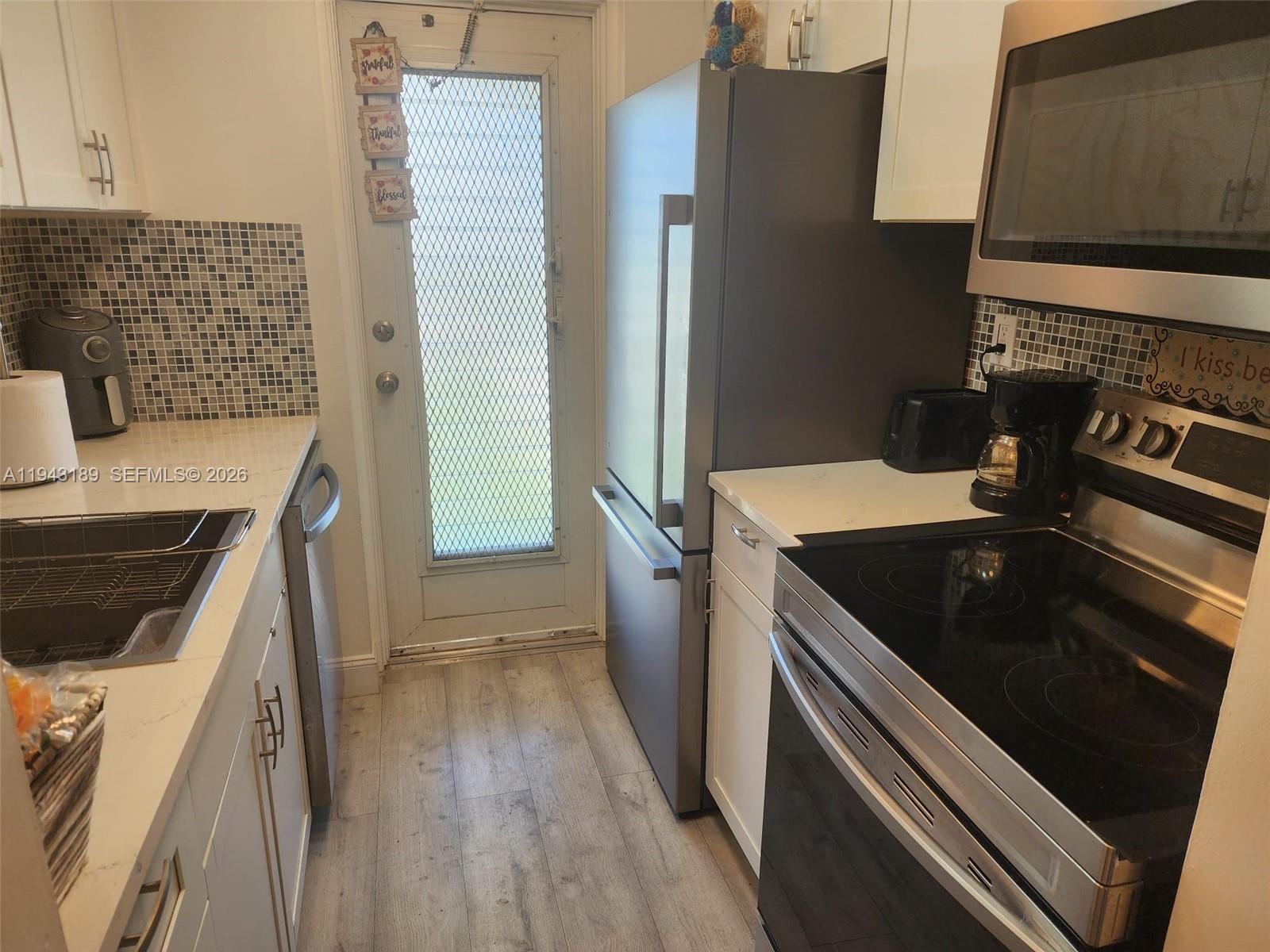 LEISUREVILLE LAKE CONDO - Residential