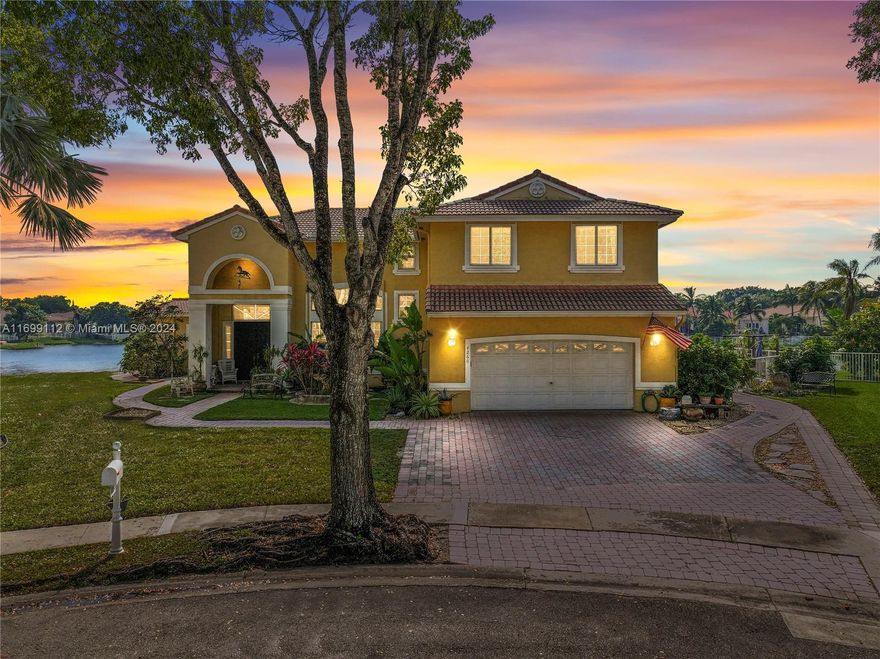 Nestled in the desirable Bristol Bay community of Huntington, this spectacular lakefront home offers a unique blend of tranquility & luxury. Situated on an expansive pie-shaped lot, this 4 bdrm 3 bath home is the epitome of South Florida living featuring a pool & spacious living areas. The master bedroom has a large sitting area attached with bay windows overlooking the lake. The owners created a bonus great room that seamlessly extends the original design, & includes impact windows & French doors leading to the beautiful outdoor oasis, all properly permitted.  This home is situated in a prime location on a peaceful cul-de-sac, yet is close to main arteries that lead quickly to shopping, dining, and entertainment venues.  Living here will provide you the best of both comfort & convenience.