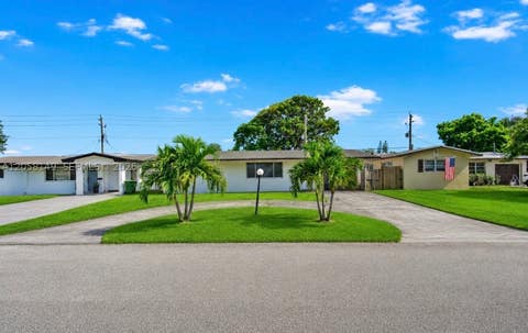 Photo of 8720 NW 11th St, Pembroke Pines, FL 33024 (MLS # A12058149)
