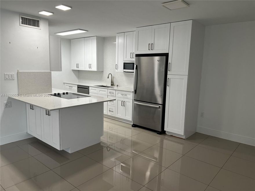 Beautifully updated and ideally located in a prime Dadeland location, this upgraded first floor unit is in Kingston Square, a popular gated complex currently undergoing major revitalization.  Beautiful new metal roofs together with new eaves and soffits are currently being installed with a completion date of Spring 2026. After that (estimated mid 2026) the buildings will get fresh stucco and be completely repainted from top to bottom, together with architectural and matching trim. The huge, shaded parking lot will get new asphalt and lining.  Pipelining of the entire complex is at or near completion —and the sellers have FULLY PAID OFF the assessment, giving buyers peace of mind.  Inside, the upgrades continue.  This remodeled unit features a new Bosch smart washer and dryer, a newly converted walk-in shower in the primary suite, an upgraded dishwasher, newer A/C and water heater, and stylish premium lighting in the living area and main vanity. New zebra shades throughout. Enjoy the ease of no stairs, plentiful parking, abundant green space, external storage, and a private screened porch all in a quiet, low-density complex undergoing a complete renaissance.  Move-in ready today, with a refreshed community to fully enjoy for many years to come.  All just moments away from world class shopping and restaurants, grocery stores, Downtown Dadeland, Baptist Hospital, Metrorail Dadeland, US1, Kendall Drive, the Palmetto Xpwy, Pinecrest, South Miami and the Gables.   Easy to show!