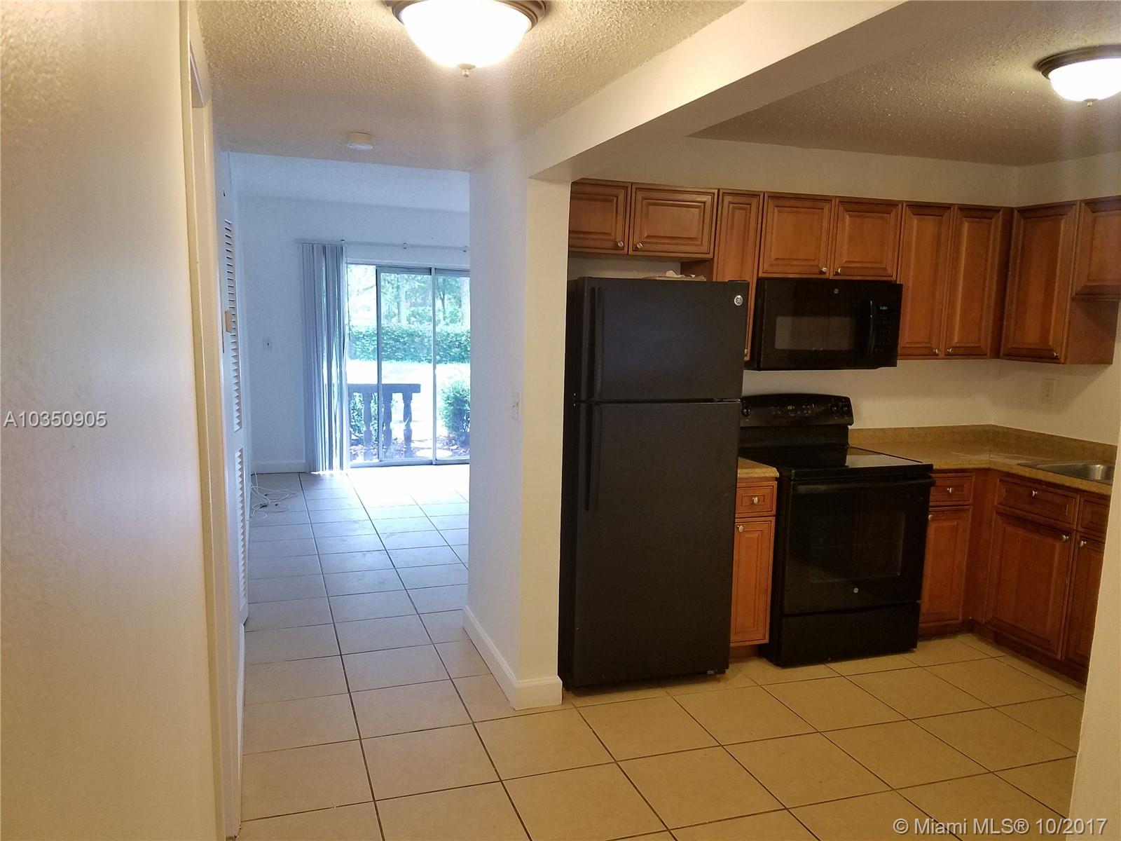 Great Location, Ready to move in, freshly paint, 1 year old all appliances, beautiful 2/2 on the first floor with ceramic floors, must see. great schools, close to mayor highways, parks, shopping malls.
