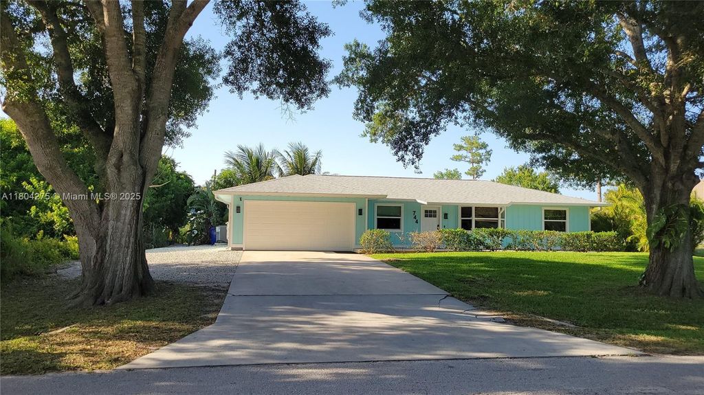 Photo of 744 Lake Dr, Sebastian, FL 32958 (MLS # A11804275)