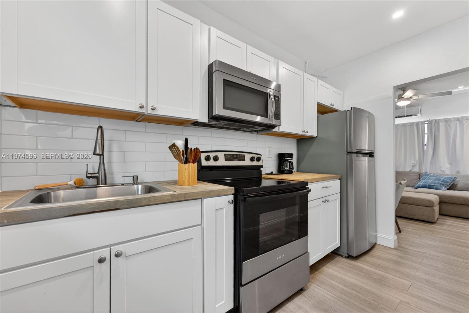 TUDOR HOUSE CONDO - Residential
