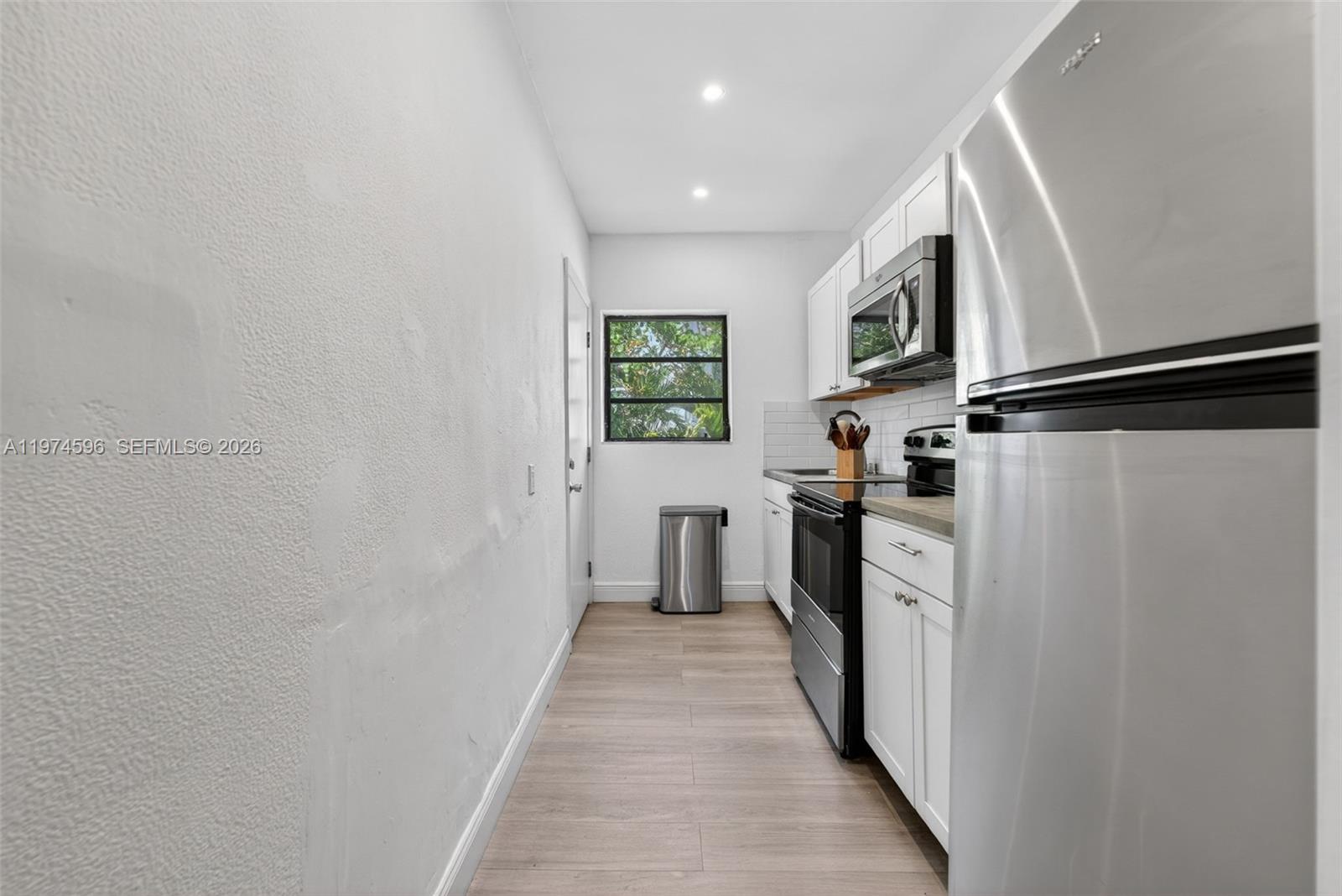 TUDOR HOUSE CONDO - Residential