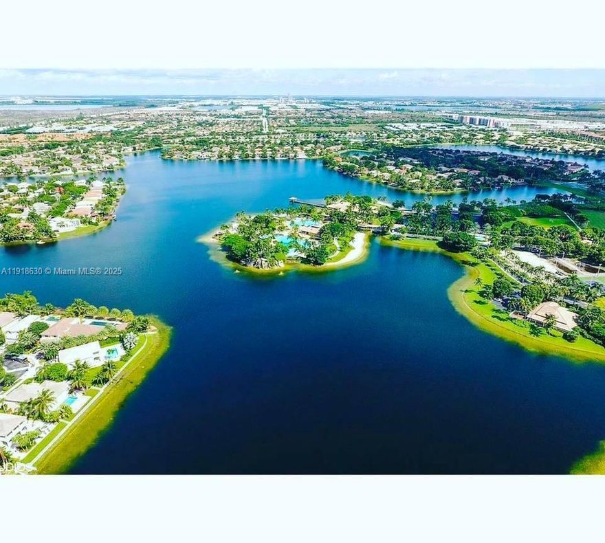 Stunning & fully remodeled resort-style living at its finest in St Croix at Doral Isles! New listing that sits in a large corner lot with 7,486 Sq.Ft, complete with a sparkling pool to enjoy year-round and unique Barbecue.  With 4 bedrooms plus a maid's quarter on the first floor and 3 complete baths, this home offers space and luxury. The fully upgraded kitchen is a chef's dream, featuring quartz countertops, soft-close drawers. Stainless steel, glass and real wood stairs, complementing real wood floors on the second floor and crystal floors through out the first floor, beautiful floor to bottom Impact-resistant sliding doors that open up to the pool area.