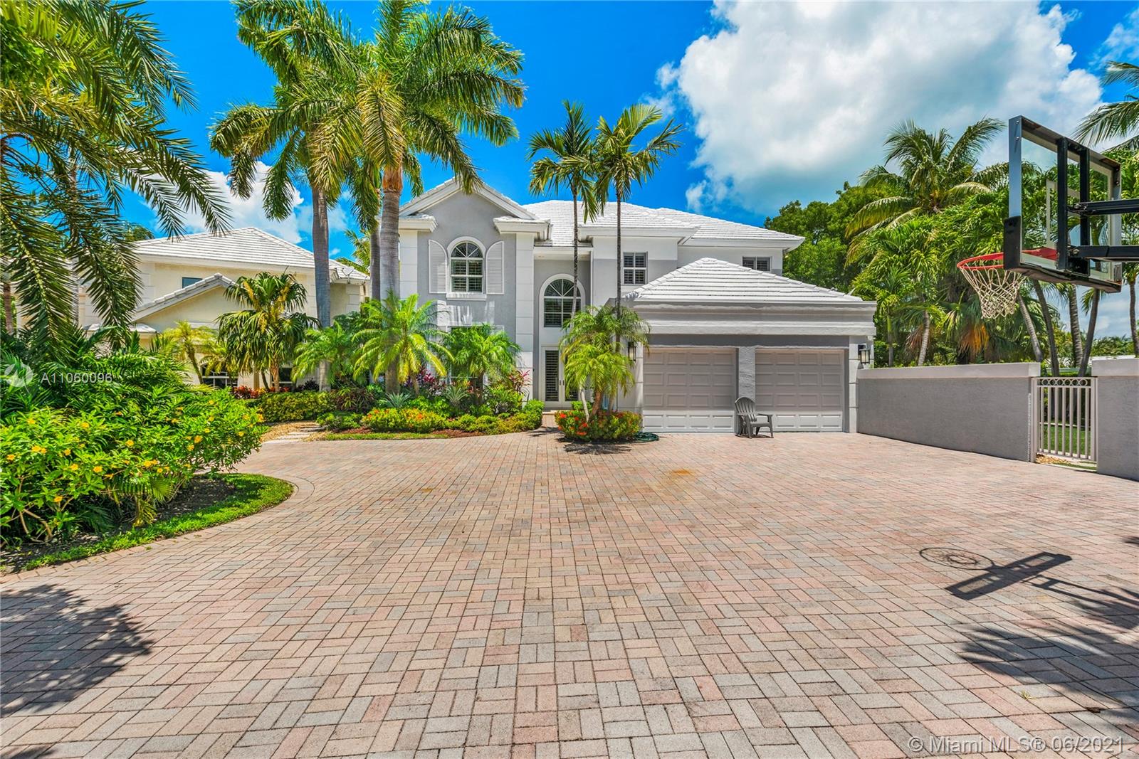 Gorgeous Grand Bay Estates Residence located on a very big corner with 10,809 Sq Ft of land. Enjoy the Key Biscayne lifestyle within a private and gated community. This fabulous home has been meticulously remodeled with the highest quality materials offering luxury, comfort and elegance with an incredible floor plan of 6 bedrooms, 5 bathrooms and impact windows and doors throughout. With 4,225 Sq Ft under A/C …it is spacious, ample with very defined areas …living room, dining room, kitchen and family room, plantation shutters, 2 car garage and an amazing pool and patio area plus a wonderful yard for kids and/or pets. Walk to the beach, the Ritz Carlton and shops.