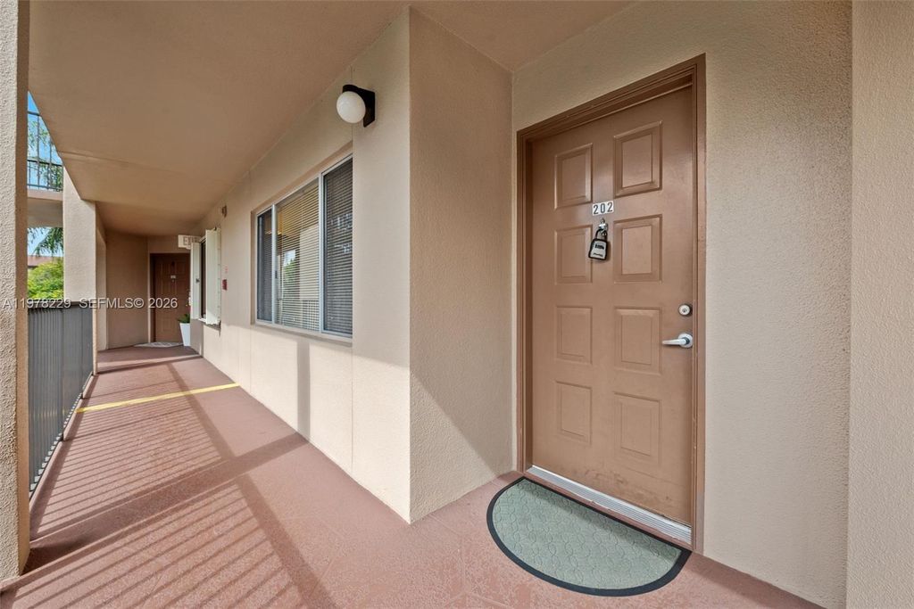 Photo of 13701 SW 12th St #202A, Pembroke Pines, FL 33027 (MLS # A11978229)