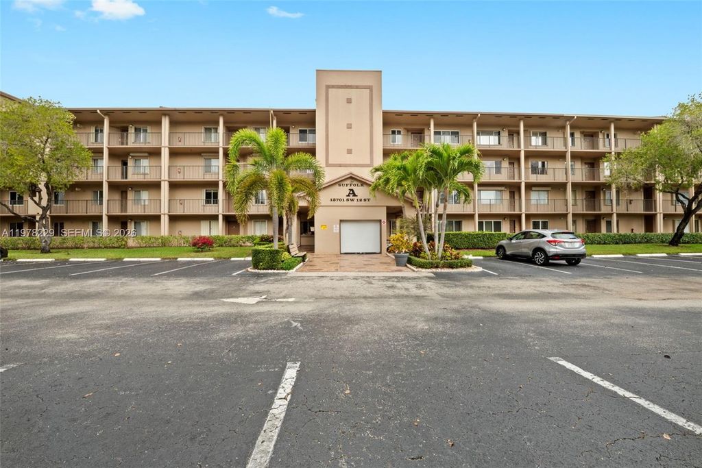 Photo of 13701 SW 12th St #202A, Pembroke Pines, FL 33027 (MLS # A11978229)