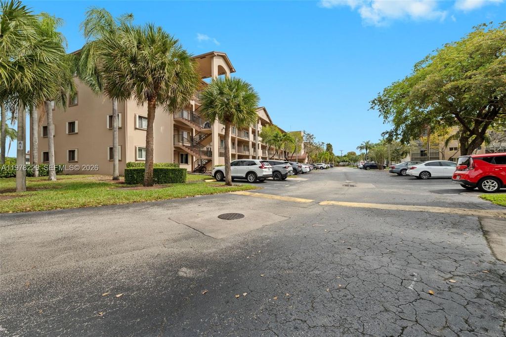 Photo of 13701 SW 12th St #202A, Pembroke Pines, FL 33027 (MLS # A11978229)