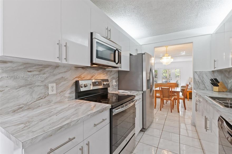 Turn-Key 2/2 Condo in Century Village – where life is anything but boring! This tastefully updated 2-bedroom, 2-bathroom condo is truly turn-key and ready for its next lucky owner. Enjoy the convenience of a washer and dryer in the unit, spacious walk-in closets,  a beautiful view from balcony, and a bright, comfortable layout designed for easy living. Step outside your door and experience a world-class lifestyle featuring: golf, pickleball, tennis, gym, indoor/outdoor pools, theater, and countless classes including dance and fitness. Social life here is vibrant and engaging! Includes 1 assigned parking space. Investor-friendly and ready to move in. Resort-style living at its best in this active 55+ community!