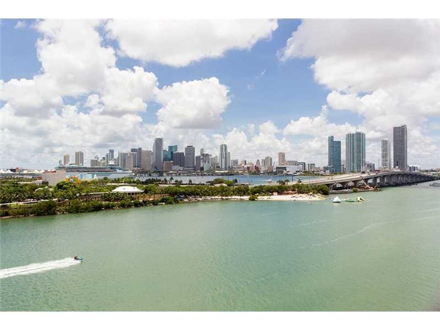 Designer Showcase surrounded by spectacular, panoramic views of Biscayne Bay & the Miami Skyline. Units 904 & 902 have been seamlessly combined into a spectacular full floor unit with a penthouse feel. This 3bed/3.5bath (4093 sq/ft per appraiser) was gut  renovated with great attention to detail. Solid teak flooring along with the 9.5" walls of hurricane resistant glass, overlooking Biscayne Bay give the feeling of living on a luxury yacht. 3 assigned parking spaces. Please see virtual tour.