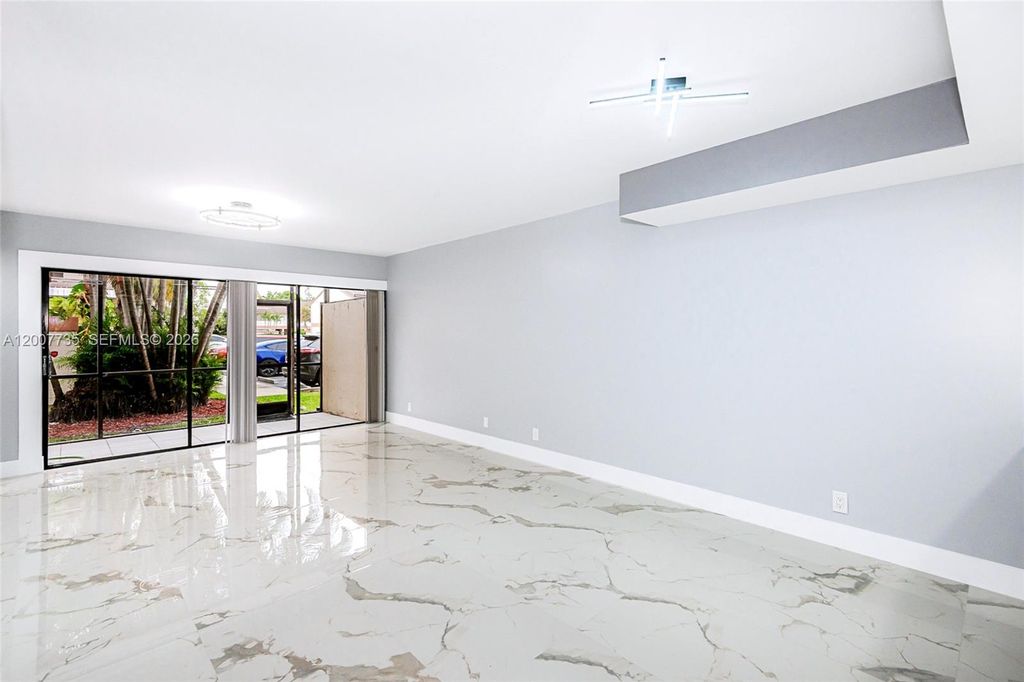 Photo of 7111 SW 42nd Pl, Davie, FL 33314 (MLS # A12007735)