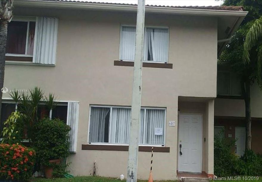 Townhouse with three bedrooms and two and a half bathrooms. Tile flooring, kitchen with bar, and balcony. Come take a look today