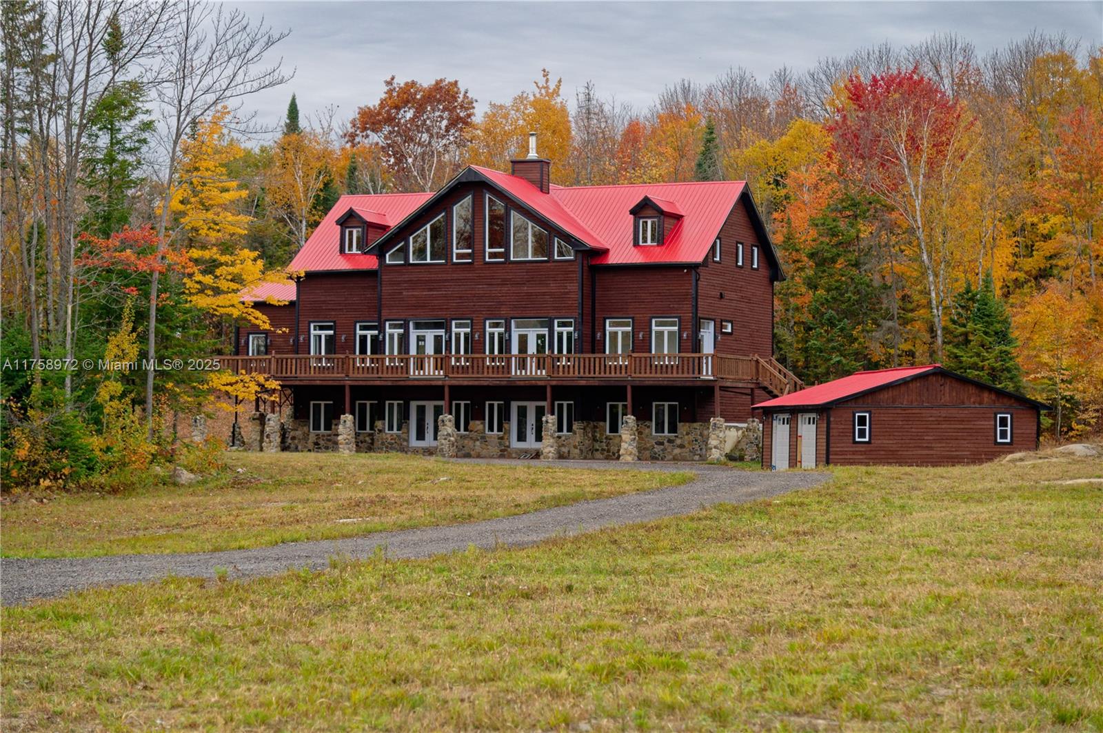 This stunning 2019 custom-built mansion in the Laurentides, just 45 minutes from Montreal, offers 10,000 sq. ft. of luxury on a vast 168-acre lot. It features 5 bedrooms, 4 bathrooms, a chef’s kitchen with a 48-inch Forno range, and a radiant floor with a heating system.
The sale includes a garage with a car lift and tools. The buyer can harvest trees valued at approx. $1.2M and can subdivide the land into 130 building lots per a surveyor’s report, presenting excellent development potential. Whether you’re seeking a luxurious family retreat or a smart investment with remarkable development opportunities, this estate offers both. Create lasting memories while securing a valuable asset for the future.