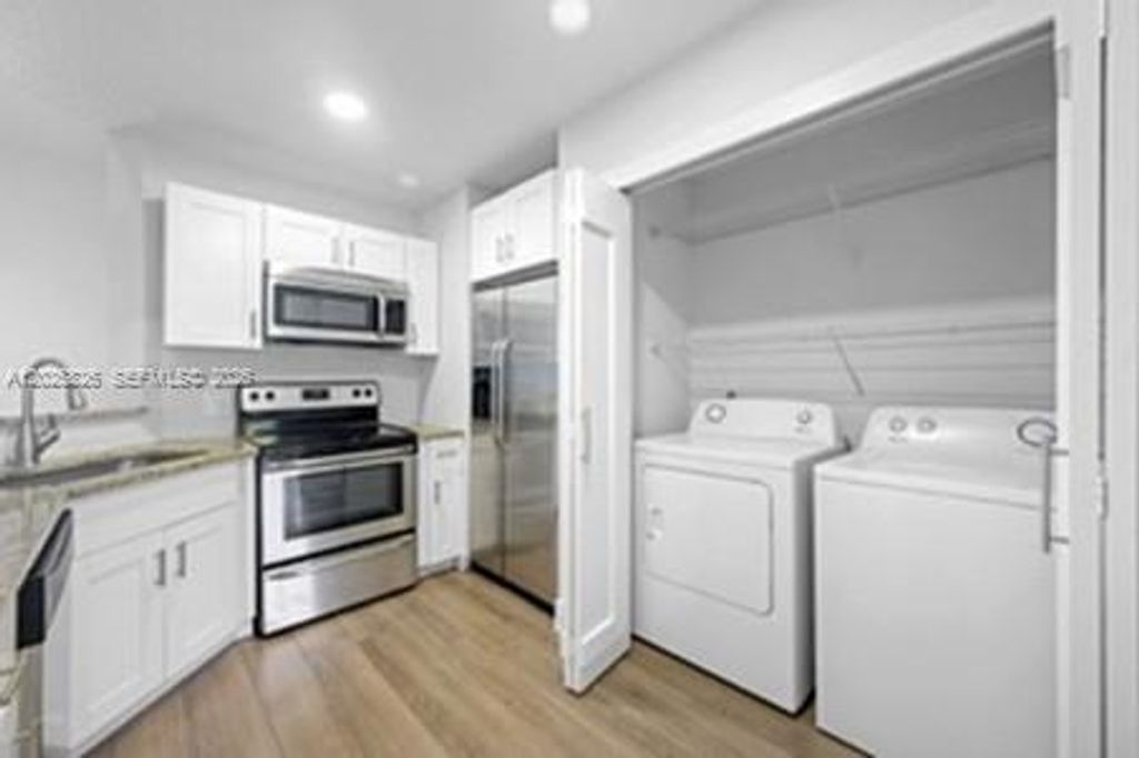 Photo of 3425 NW 44th St #204, Oakland Park, FL 33309 (MLS # A12025826)