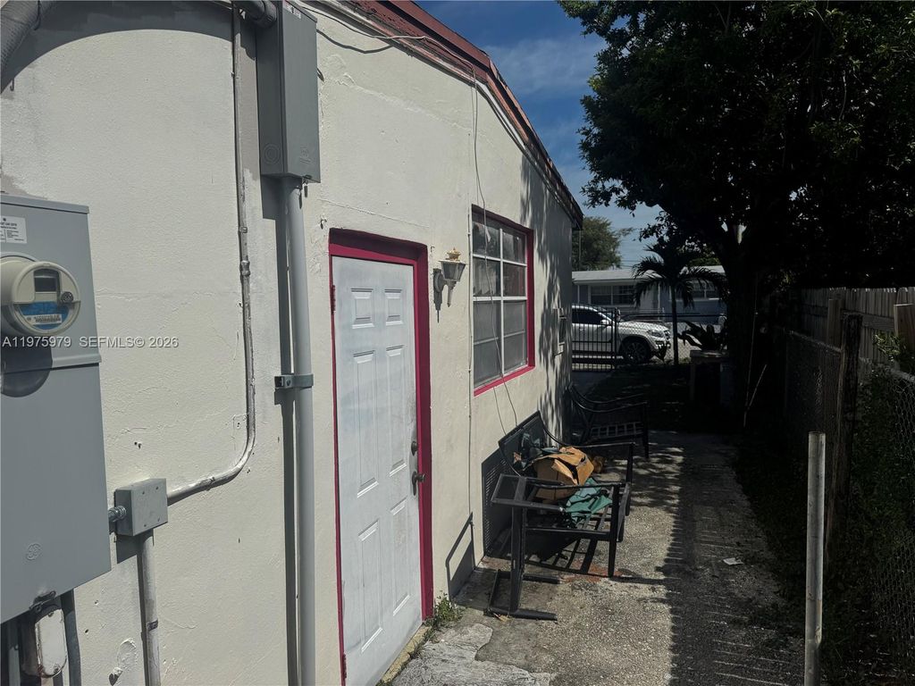 Photo of 1119 NW 11th Ct, Fort Lauderdale, FL 33311 (MLS # A11975979)