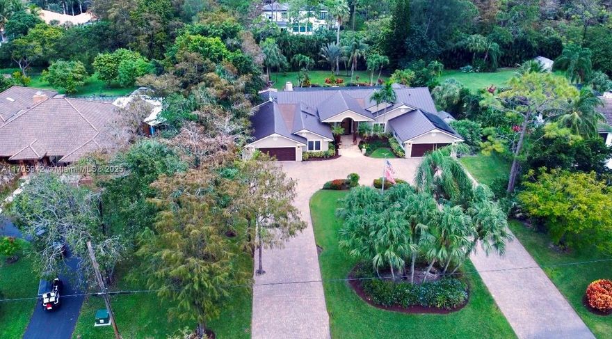 Luxury Custom Estate 5BD, 5BTH one story on 1.09 acres in Parkland with NO HOA. Fully upgraded single story home 5,026 adj sqft, Driveway for 20+ cars, a Grand Foyer w/ vaulted ceilings, breathtaking views of lagoon pool, fountains & fireplace. With $600k+ in upgrades, New Solar Panels, Impact Windows & Doors, Smart Home System controls lights, climate & security cameras via mobile device, Chef's Kitchen w/ New 6-burner gas, Sonos sound system, central vacuum, climate-controlled garage, Winery, Full Bar, Marble Floors, RV'boat hookups & septic access, underground electric pet fencing, New Metal roof, 45 KW generator, 3 A/C Zones, State of ART THEATER & Resort Style Outdoors, New outdoor kitchen. Near equestrian center & A schools. Come See Dream Private Estate with NO HOA move in ready.