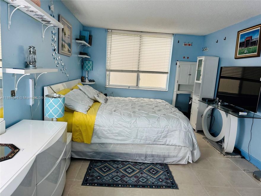 Exceptional and beautiful remodeled 1 bedroom unit in a 55+ gated community close to all services and beaches. This unit has everything to satisfy you.
Full remodeled with high quality products: new white kitchen cabinets, new bathroom, new stainless-steel appliances, ceramic flooring, water purification system, tankless water heater and A/C Lindstrom, all windows are hurricane impact and in the Florida room as well.  Nice view to the heated community pool and gardens.