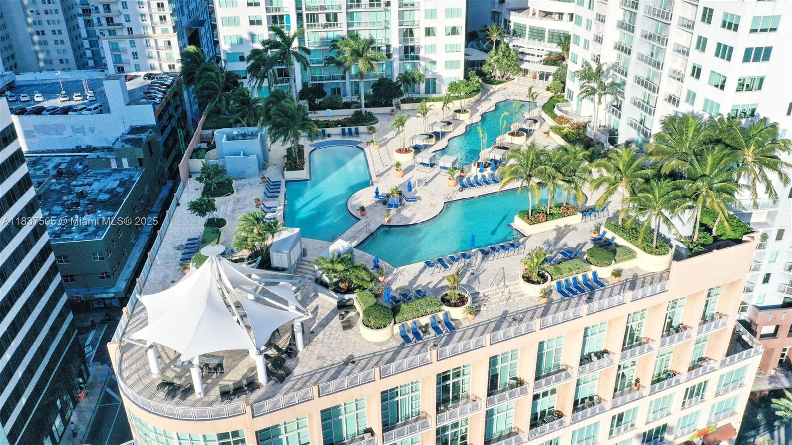 CONV DOWNPAYMENT AS LOW AS 5%! (BUDGET IN ATTACHMENTS). SHORT-TERM RENTALS OK! SPECIAL ASSESSMENTS. 2-Story Loft in Downtown Miami steps away from Bayfront Park and Marketplace, and nightlife entertainment. Features 20-foot ceilings, sleek wood floors, and expansive impact windows that flood the space with natural light. 2nd floor built-ins. IN-UNIT WASHER AND DRYER! With nearly 1,000 sq ft of open living, it’s both stylish and functional, complete with 1 PARKING SPACE AND A STORAGE UNIT ON THE SAME FLOOR. Located in Vizcayne North, enjoy resort-style amenities like four pools, a spa, a fitness center, and a private movie theater. PETS OK!