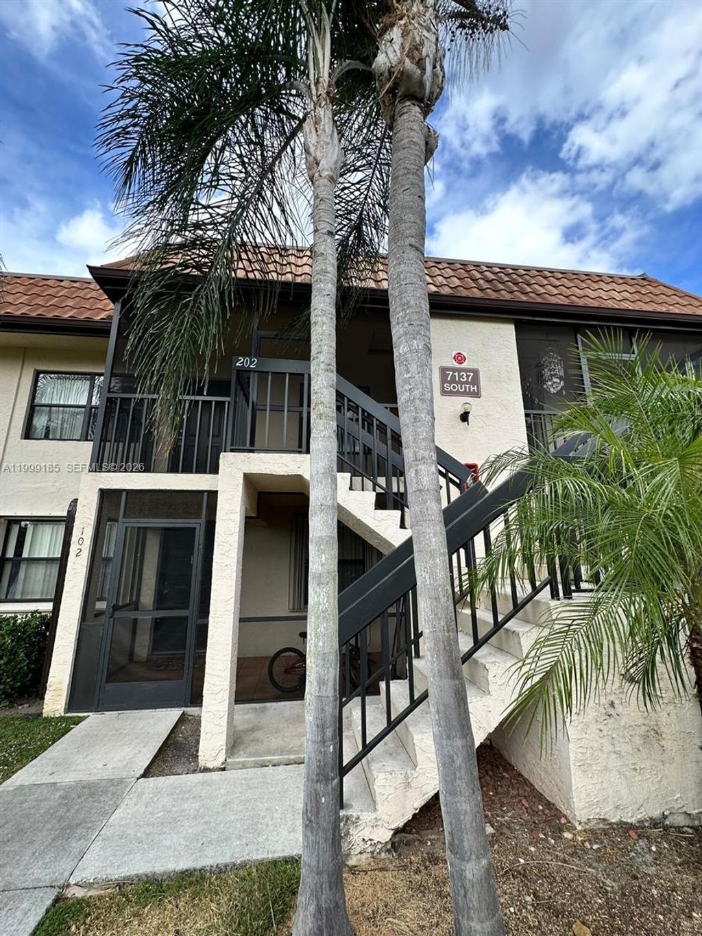 Photo of 7137 Golf Colony Ct #202, Lake Worth, FL 33467 (MLS # A11999185)