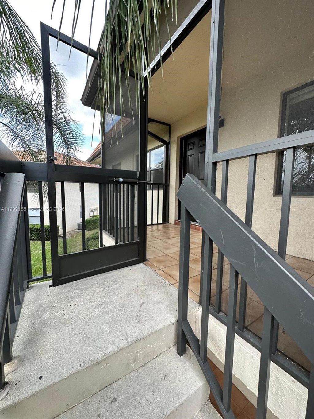 Photo of 7137 Golf Colony Ct #202, Lake Worth, FL 33467 (MLS # A11999185)