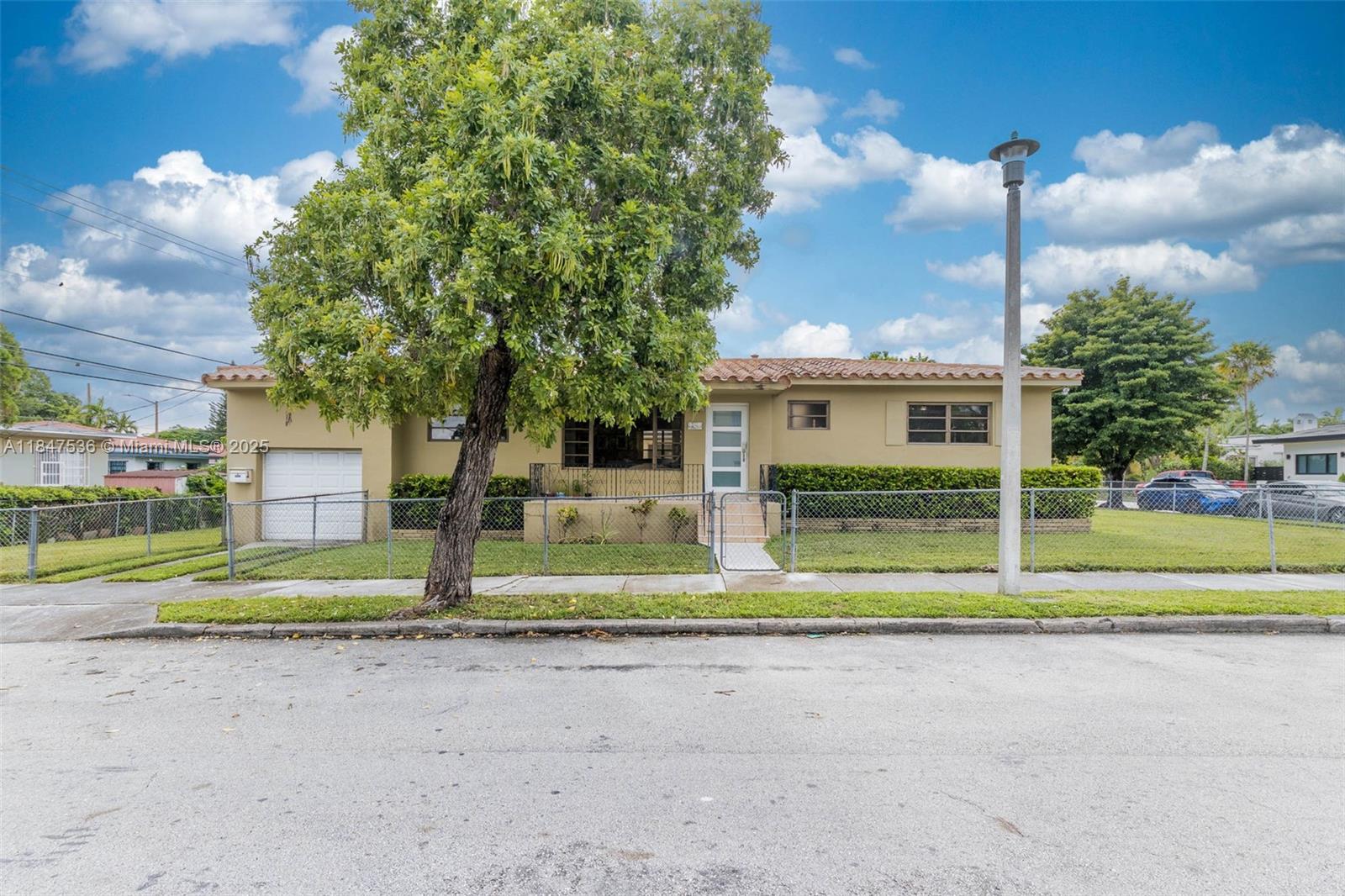 Located on a peaceful, tree-lined street in one of Miami’s most coveted and centrally located neighborhoods, this Shenandoah gem offers an opportunity (at a rarely seen price point) to reimagine a classic home with incredible potential. Set on an oversized corner lot, the property features expansive yard space with room for a pool. Inside, oversized windows flood this 2 bed/2 bath + garage with abundant natural light. Whether you're looking to renovate, expand, or simply settle into a charming home, this property is a must-see. Just minutes from Coral Gables, Coconut Grove, Brickell, and MIA, Shenandoah offers timeless appeal, strong property values, and one of the highest elevations in Miami (no floods!)