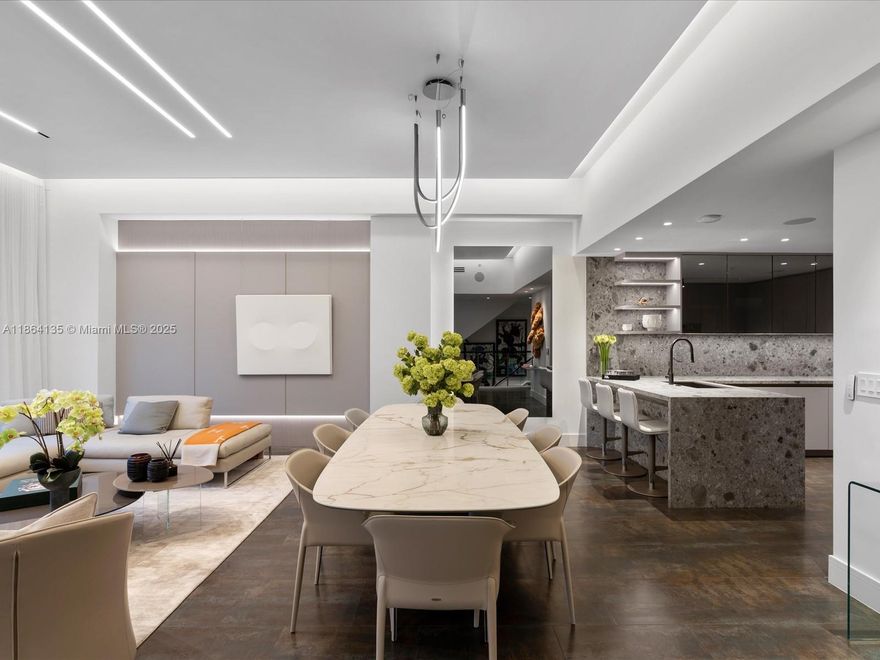 Now is your opportunity to live in a home crafted by the acclaimed design team behind Lionel Messi's Florida residence. This three-story villa offers panoramic Atlantic views, direct beach access, and a flexible layout featuring 2 bedrooms, 2.5 baths, plus a den that can easily be converted into a 3rd bedroom. Highlights include a private elevator, chef's kitchen with SubZero and Thermador appliances, an in-unit sauna, steam shower, a Crestron video surveillance system, and an entertainment room with a pool table, TV, and bar to enjoy with guests. Resort-style amenities for residents include an oceanview pool, spa, gym, concierge, valet, clubroom, and the convenience of a private, deeded 2-car garage located within the building’s main residential garage.
