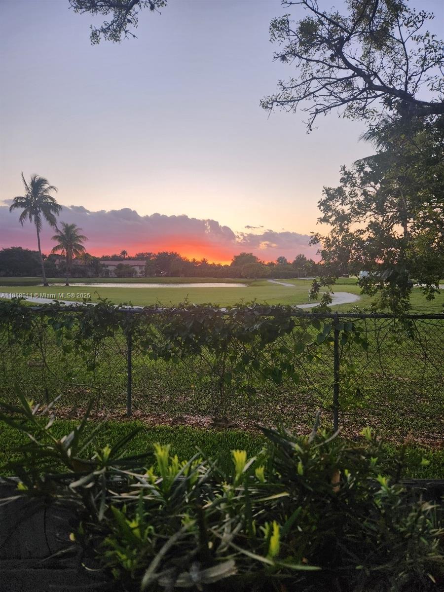 Desirable Briar Bay corner unit perfect for entertaining with breathtaking views of the pond and golf course. The nicely updated single-level townhome has vaulted ceilings, fresh interior paint, a remodeled primary bath, a new shingle roof, and new wool Berber carpet in both bedrooms. Design meets perfection with this Miami Gem! Low HOA fee is $385 semi-annually.