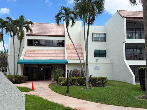 Photo of 301 Racquet Club Rd #203, Weston, FL 33326 (MLS # A11890308)