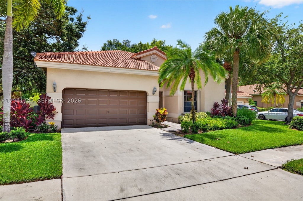Photo of 1380 NW 103rd Ter, Plantation, FL 33322 (MLS # A12041745)