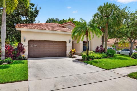 Photo of 1380 NW 103rd Ter, Plantation, FL 33322 (MLS # A12041745)
