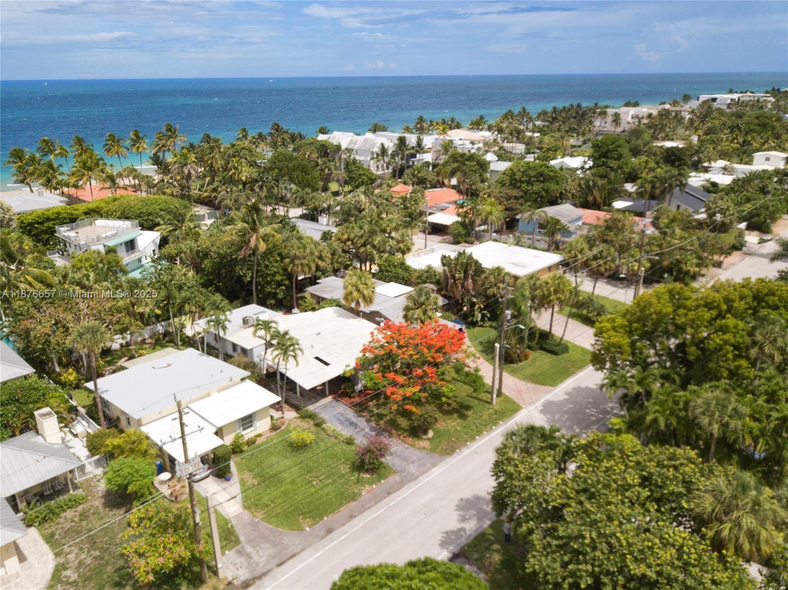Prime Coastal Opportunity in FTL’s Premier Beachfront community. 2,154 SF property in Lauderdale Beach sits EAST of A1A, placing you at the ocean’s doorstep. It’s the only enclave of its kind, offering unmatched beach access & proximity to shopping, nightlife & DTWN. Steps to sandy shores, ocean breezes & the Atlantic horizon. Minutes to DTWN Fort Lauderdale & Lauderdale-by-the-Sea w/ reefs & coastal dining. Safe & Secure—Sought-after, well-patrolled community w/ off-duty police for added security. Resorts, parks, Publix, biking & walking routes reinforce the area’s luxurious yet livable character. Ideal for Investors. The house has mid-century charm, but the true value lies in the lot & location. Tear it & design a custom coastal residence w/ ocean view—or fix-&-flip w/ instant equity.