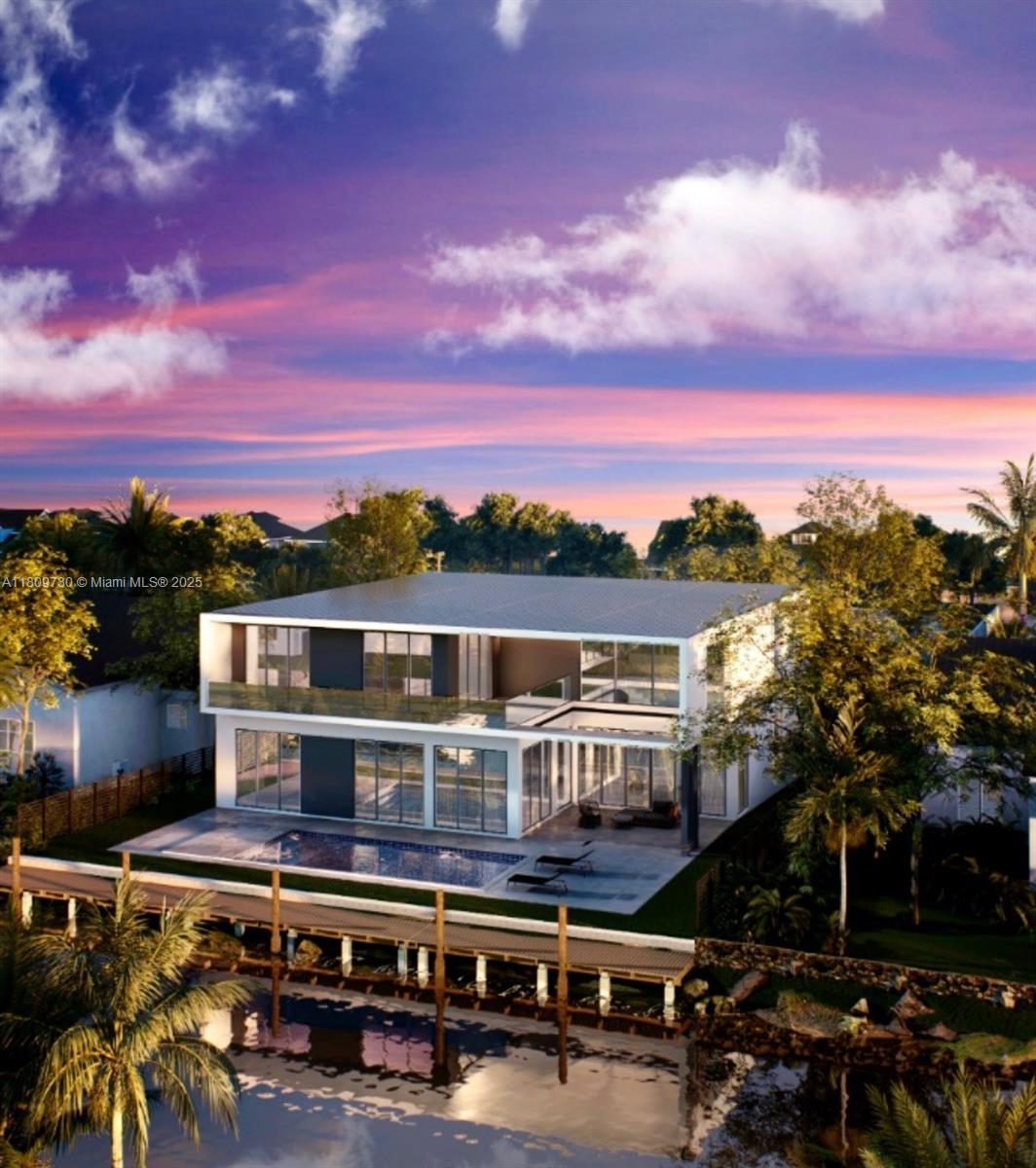 Vacant lot with approved shovel-ready plans for a two story single family home! This is a unique opportunity to bring your vision to life in one of Miami's most desirable neighborhoods. Build your dream home on this rare lot in the heart of El Portal, Miami! Spanning 8,395 square feet, this exceptional property offers 73 feet of waterfront with direct access to Biscayne Bay. Imagine the endless possibilities for creating your ideal oasis, all while being just minutes away from premier shopping, dining, parks, and convenient transportation. Don’t miss your chance to secure this exceptional location