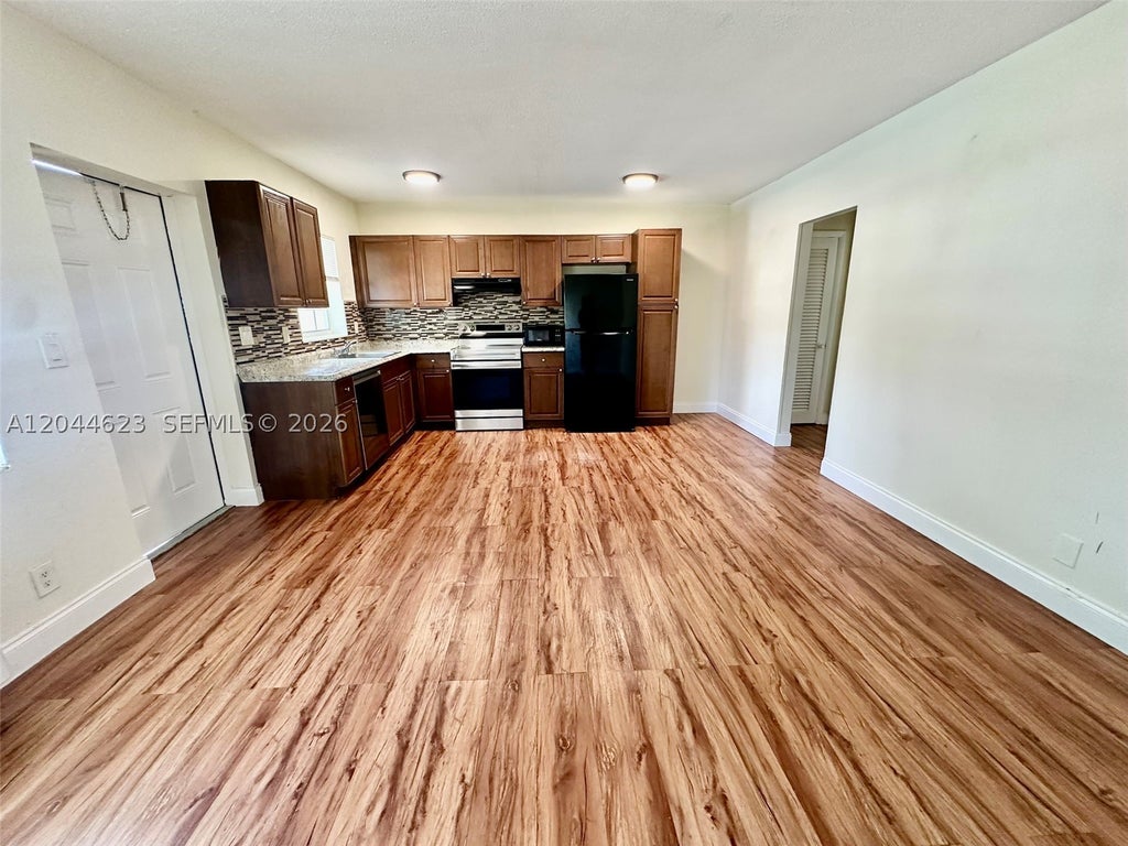 Photo of 5420 NE 22nd Ter #6, Fort Lauderdale, FL 33308 (MLS # A12044623)