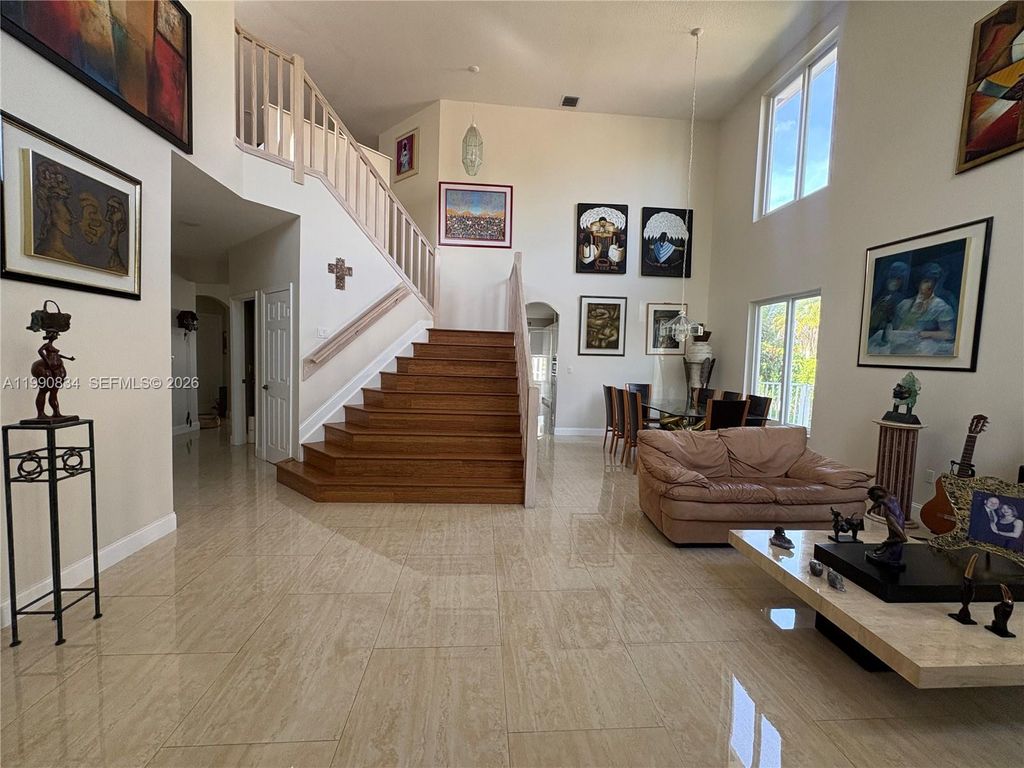 Photo of 12513 NW 18th Mnr, Pembroke Pines, FL 33028 (MLS # A11990834)