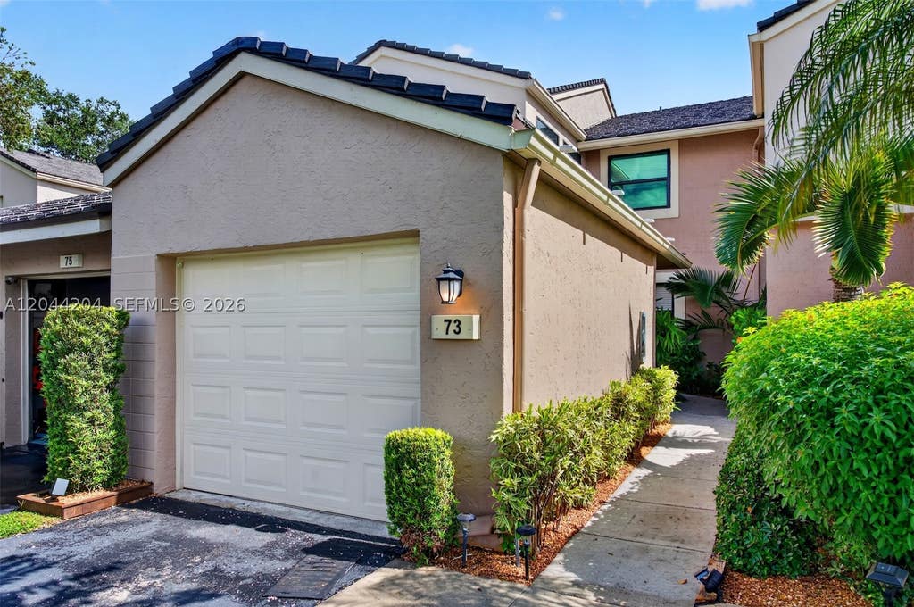 Photo of 73 NW 98th Ter, Plantation, FL 33324 (MLS # A12044204)