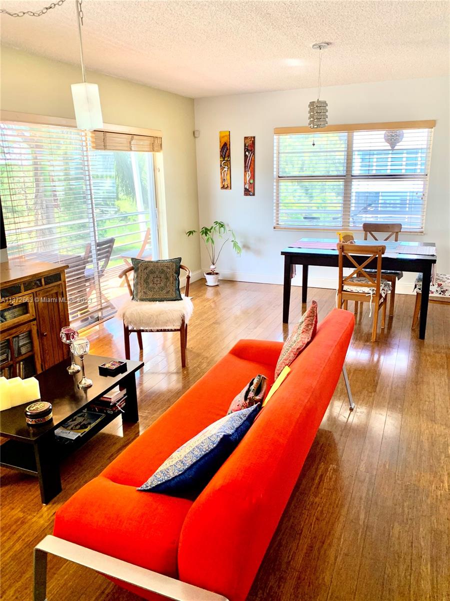 Beautiful apartment located on the fourth floor with spectacular views of the garden and the pool. Extremely cozy and bright. Open kitchen. Walking closet. Quartz countertop. This unit is unique and spectacular. Tile and bamboo flooring Lots of ventilation, ready to move-in. Brand new A/C and NEW Tankless Water Heater too. Large pantry. Enclosed double balcony with pool view and garden. Trash and Laundry facilities on every floor. Recreation area, Heated pool, BBQ and picnic areas, good lighting and landscaping, well-kept complex is close to shopping centers, restaurants and main highways. This unit can be rented after 2 years. It is a 55+ community, allows a companion over 18 years old