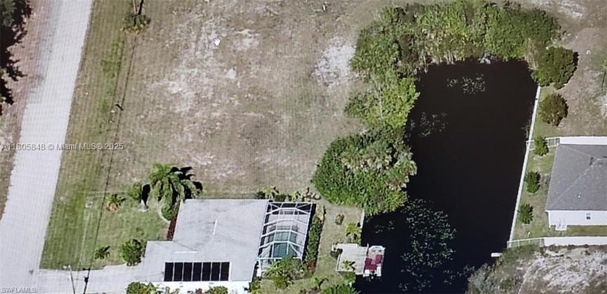 Prime Vacant in land in Southwest Cape Coral-"Canal View" Build your dream home on this spacious 3 lot located in the highly desirable Southwest Cape Coral area. Enjoy stunning canal views an the tranquility of waterfront living, with plenty of room to design the home you're always envisioned, this property offers the perfect setting for luxury and confort. Don't mis  this opportunity to create your own paradise in one of Florida's fasted-  growing communities!!! Clean lot close to shopping centers and much more...Don;t miss out this opportunity.
