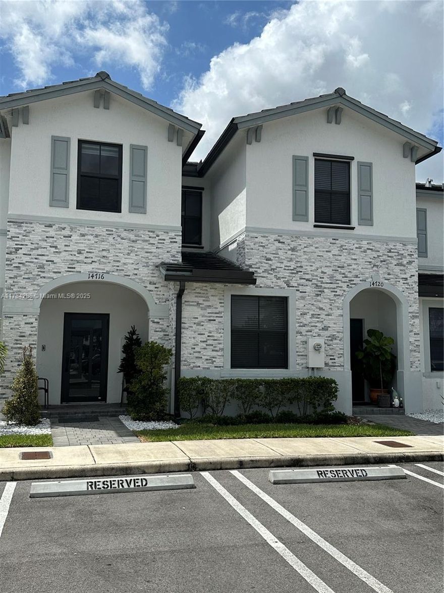 Welcome to your dream townhome in the highly sought-after VENEZZIA by Lennar community! This stylish 3-bedroom, 2.5-bathroom residence offers 1,550 sq ft of modern living space designed for comfort and convenience. Built in 2021, the home features tile flooring throughout the first floor, laminate flooring on the second floor, shutters for storm protection, and a beautiful backyard — perfect for relaxing or entertaining. The spacious primary suite includes an ample walk-in closet. Ideally located with easy access to shopping and dining, this property also includes two dedicated parking spaces plus guest parking. Enjoy the benefits of a low HOA, which covers access to a community pool, playground, and night security. Don’t miss this opportunity to live in this desirable neighborhood!