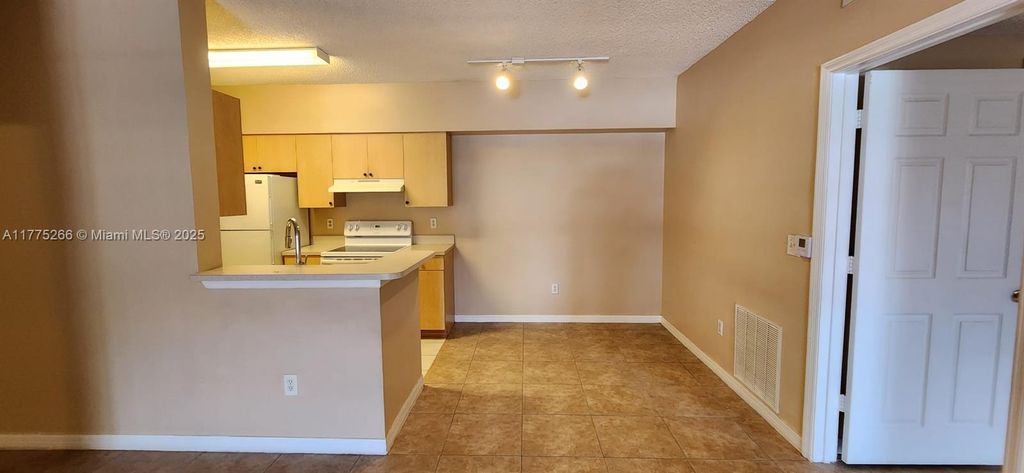 Photo of 10312 S Fox Trail Rd S #1004, Royal Palm Beach, FL 33411 (MLS # A11775266)