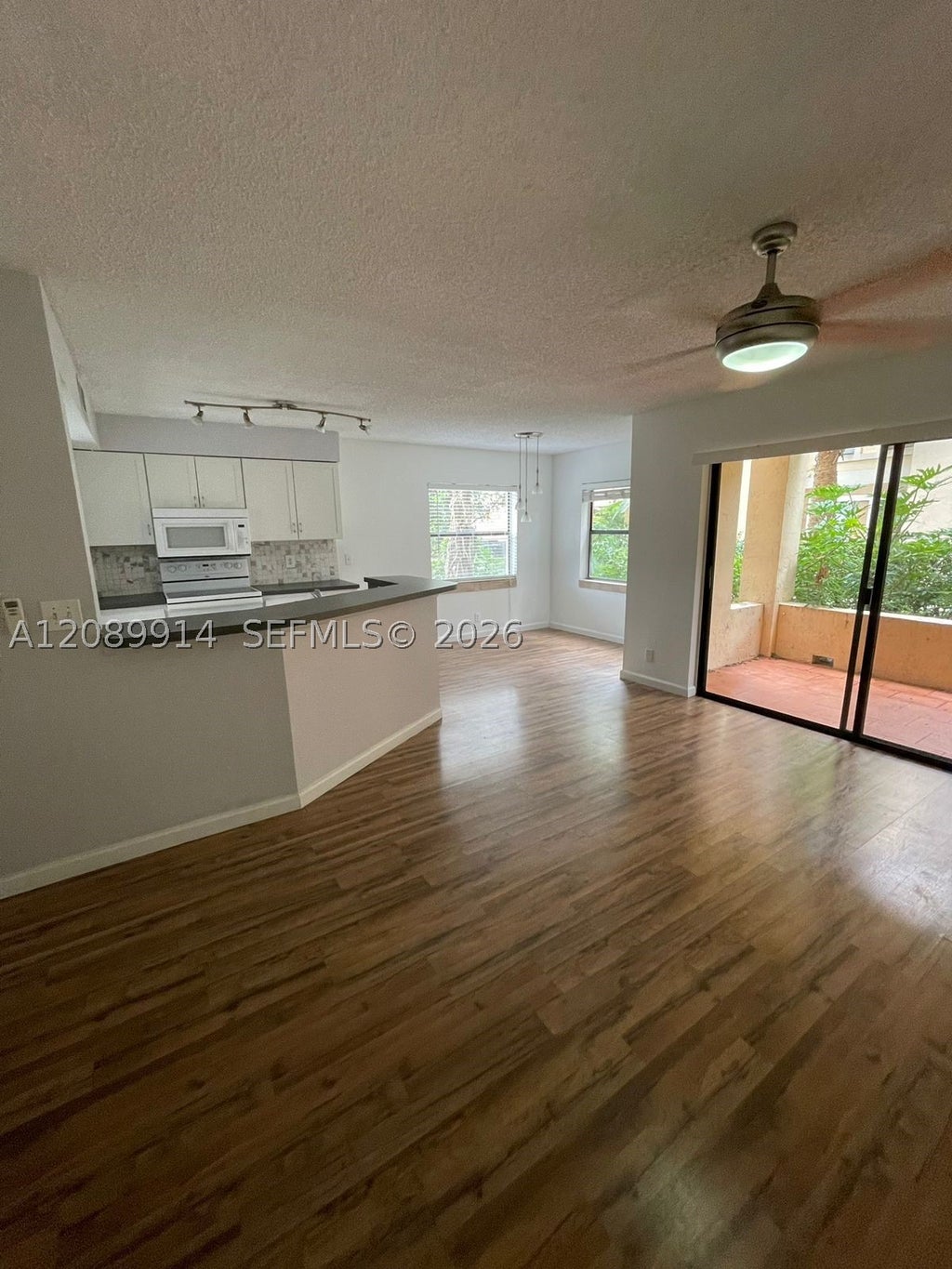 Photo of 9999 Summerbreeze Dr #413, Sunrise, FL 33322 (MLS # A12089914)