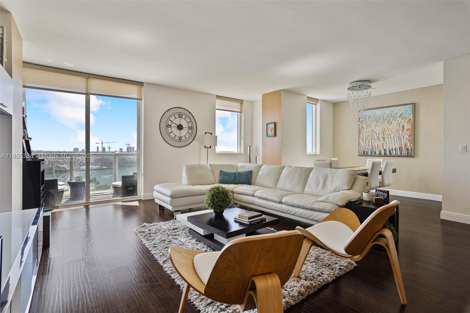 Live in the heart of Downtown at 244 Biscayne Blvd! This bright corner unit features 2 bedrooms, 2.5 bathrooms, and a large den, offering ample space for work or guests. Enjoy beautiful Biscayne Bay views from the comfort of your home. The open kitchen boasts stainless steel appliances and granite countertops. Located in a full-service building with resort-style amenities—pool, fitness center, spa, 24-hour concierge—and just steps from Bayfront Park, shopping, dining, and the Kaseya Center.